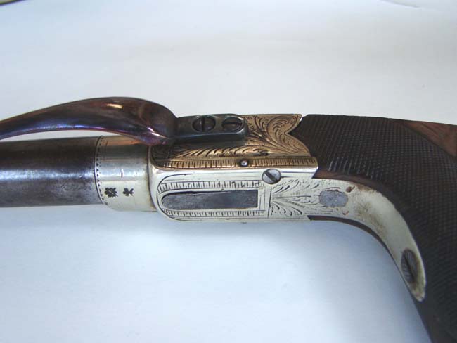 An English percussion 'boot' pistol by William Westley Richards, Gunmaker to Prince Albert, circa 1840-1850. — image 6
